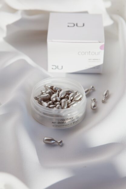 Lifting Drops DU Cosmetics en frasco con 50 lágrimas monodosis, antiarrugas con Argireline para contorno de ojos y labios.