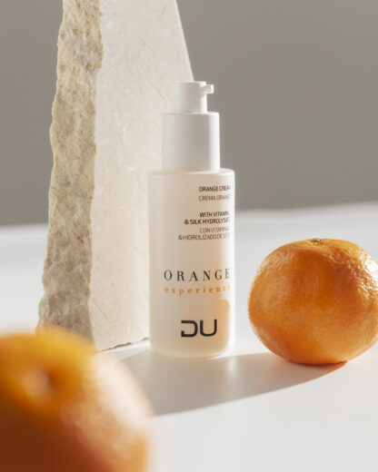 Orange Cream DU Cosmetics en envase de 50 ml, crema hidratante multivitamínica con extracto de naranja y seda.